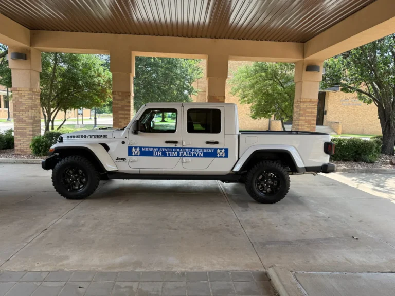 Rolling Representation: Temporary Vehicle Graphics for Murray State College Parade